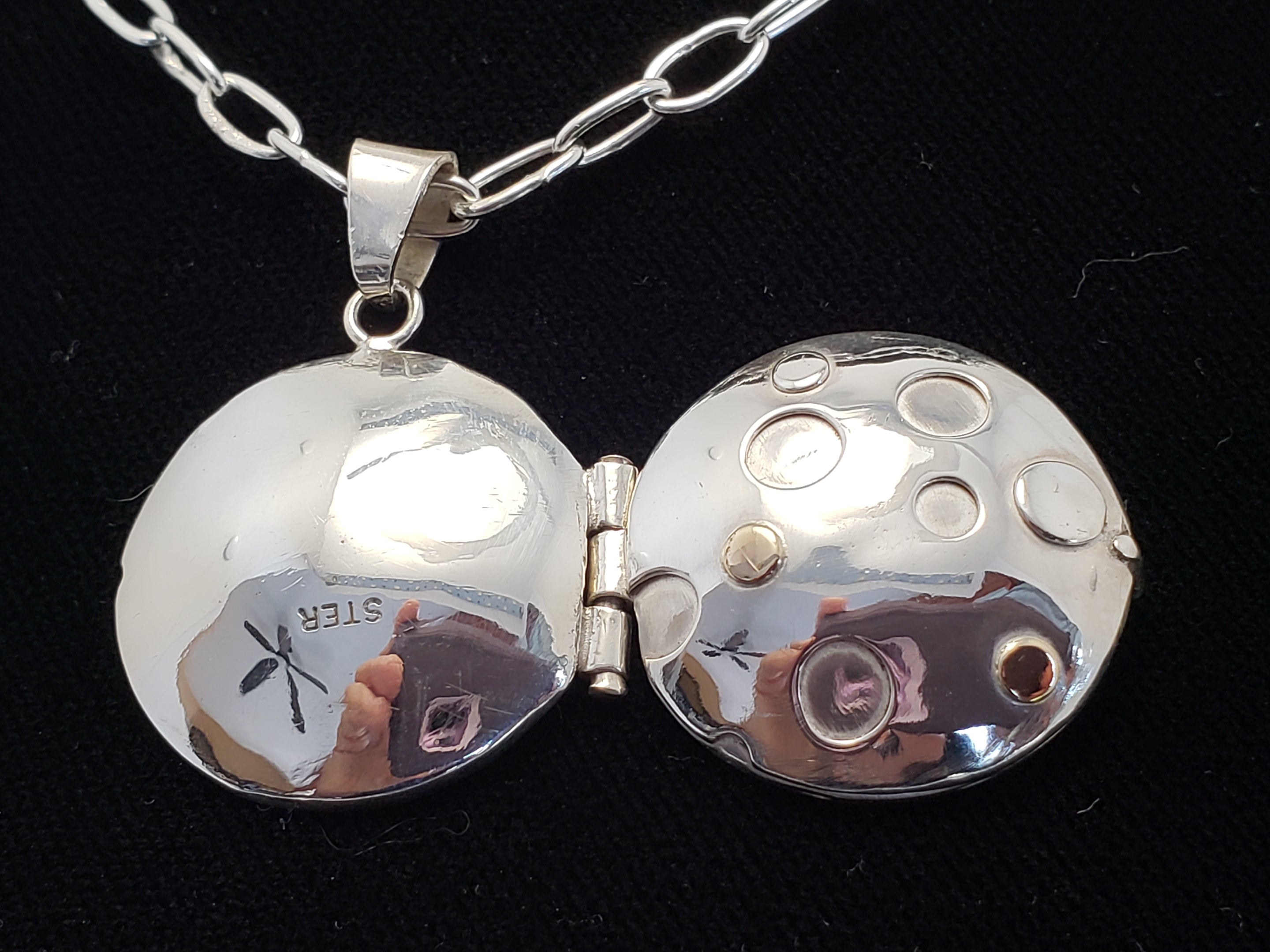 Sterling locket with 18K gold accents