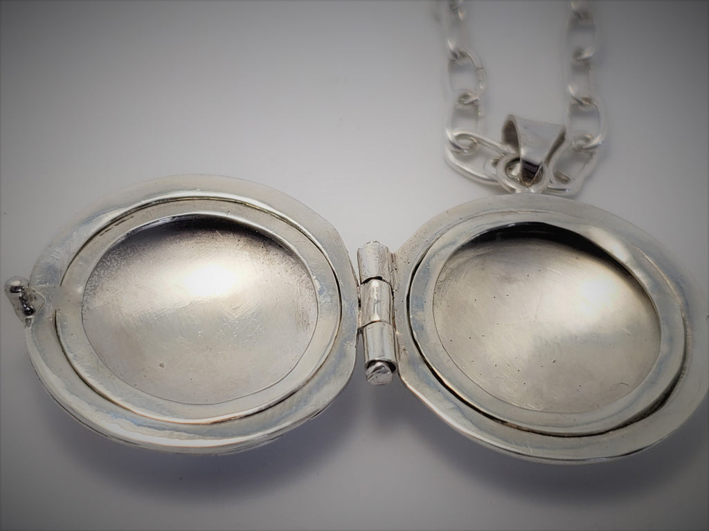 Sterling locket with 18K gold accents