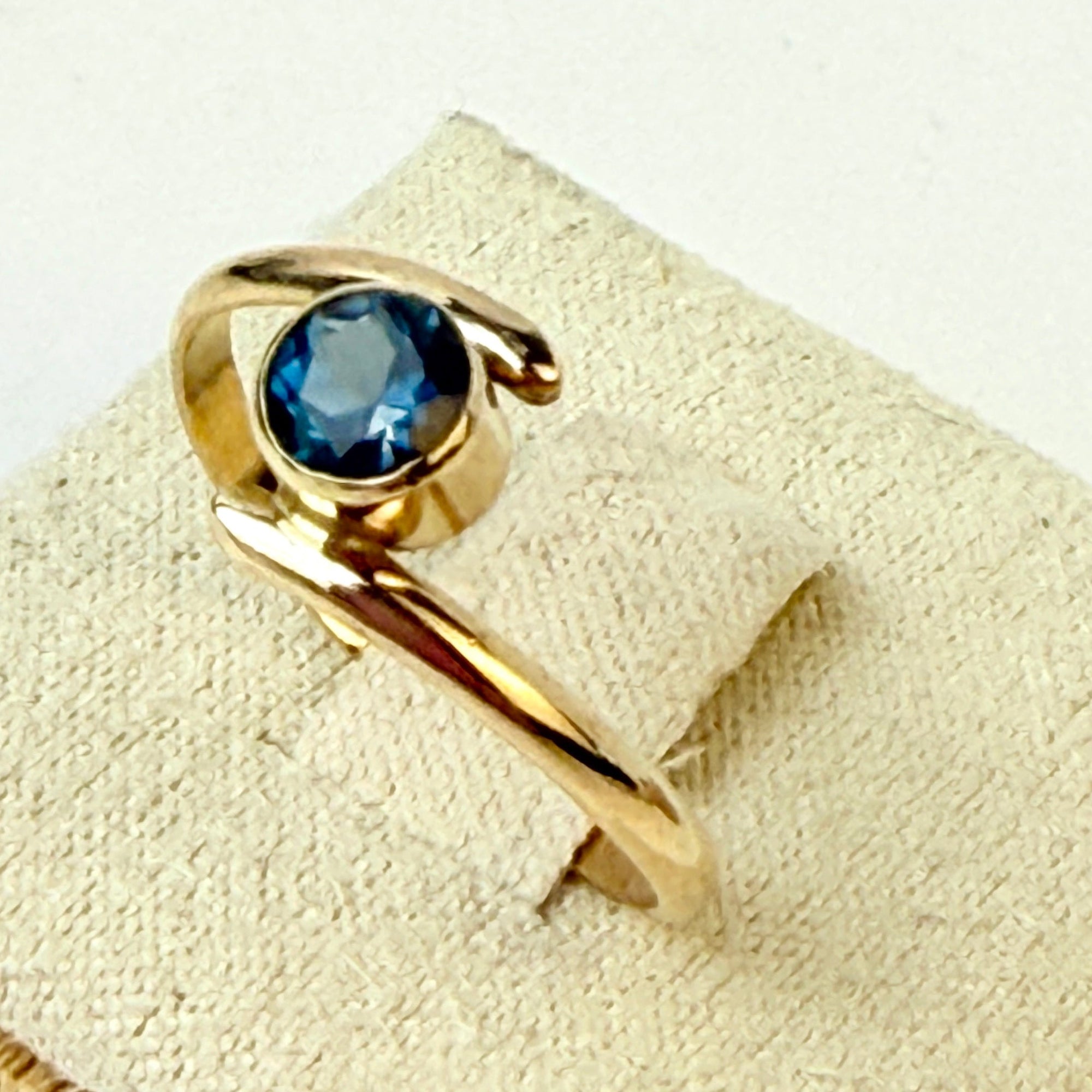 14K Gold Bypass ring with London Blue Topaz  size 7.5
