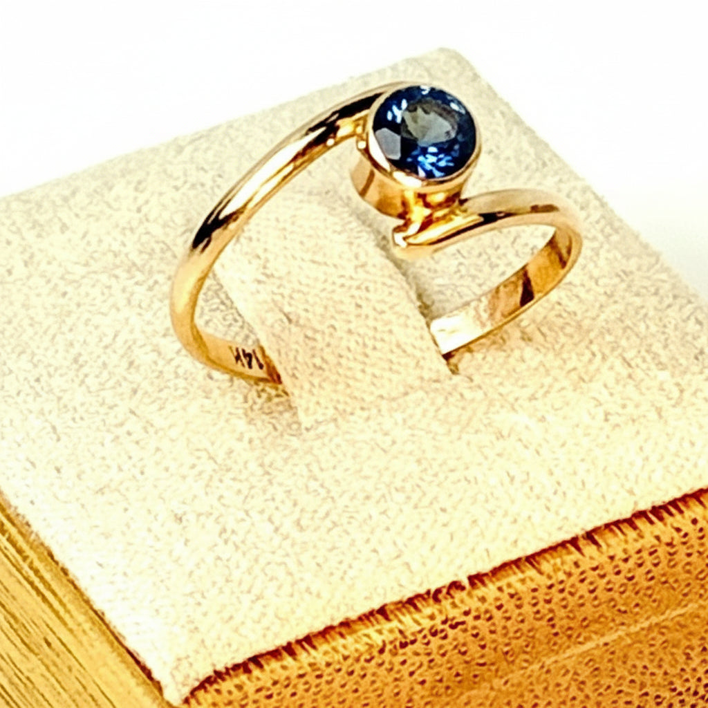 14K and London Blue Topaz Bypass ring size 7.5
