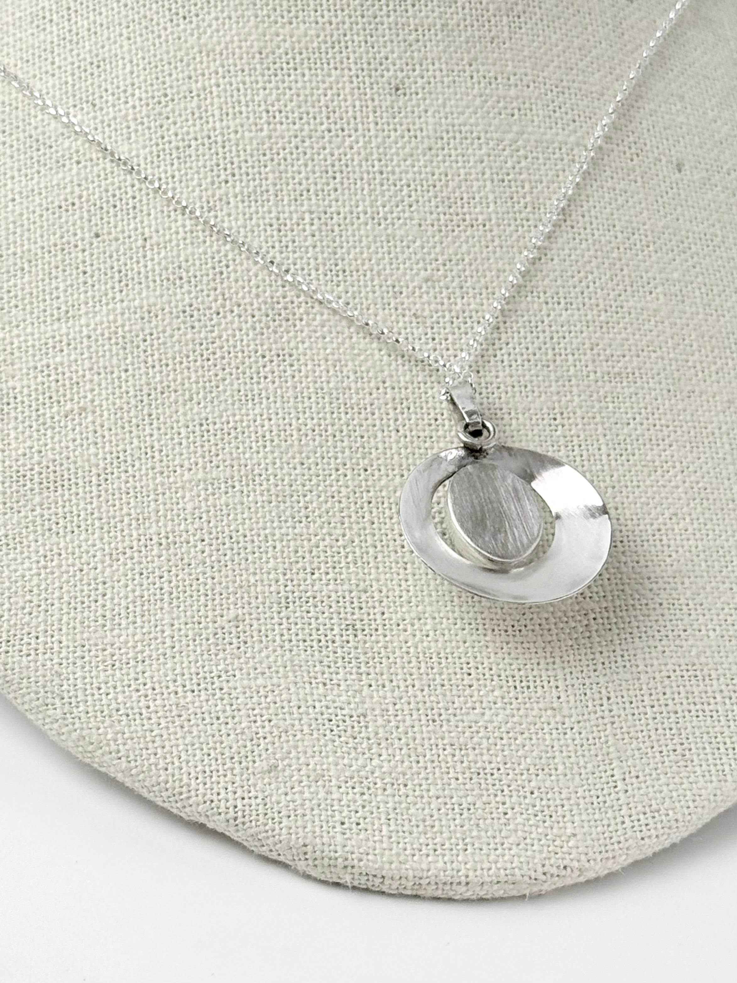 Round Aquamarine and Silver Pendant