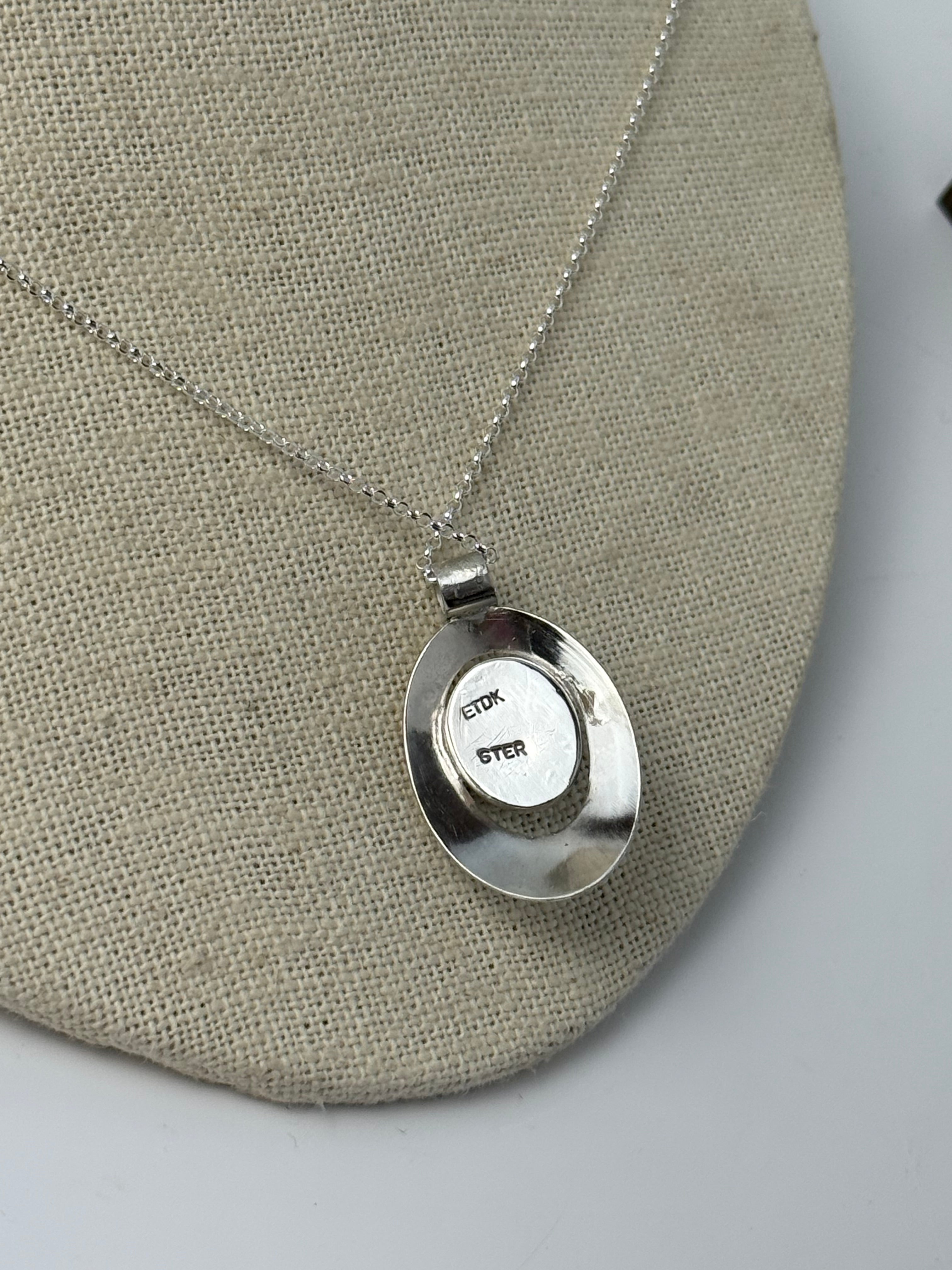 Oval Aquamarine and Silver Pendant