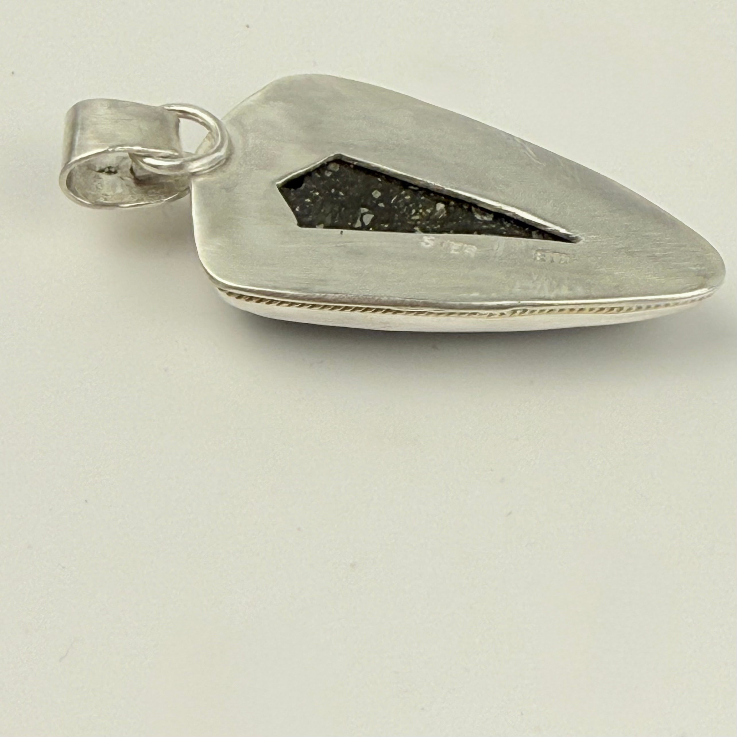 Marcasite pendant embellished with gold and diamond